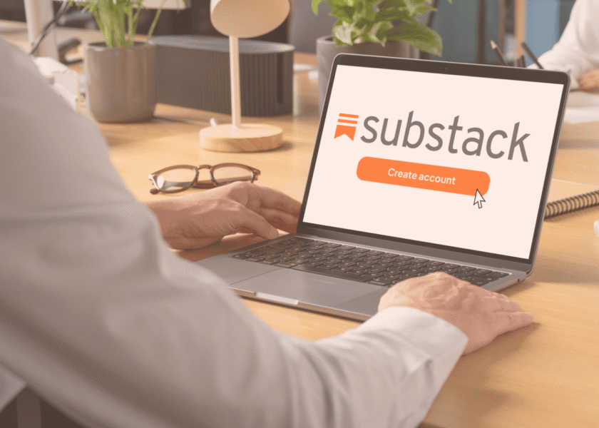 Person looking at laptop screen contemplating whether to create a Substack account
